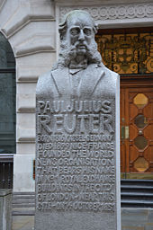Staty över Paul Reuter i City of London.